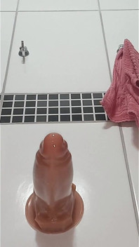 In the Bathroom Shoving the Dildos in My Ass