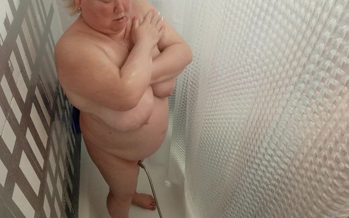 Sweet July: Mother-in-law Takes a Shower and Washes Her Big Tits