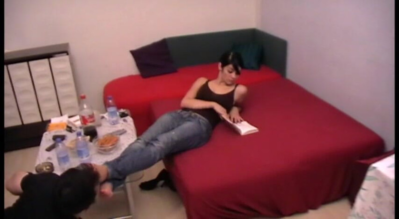 Femdom Austria: Licking feet by the coffee table