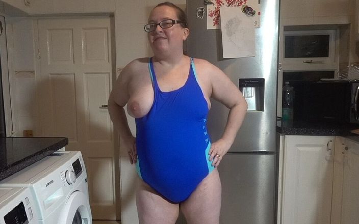 Horny vixen: Sexy blue swimsuit