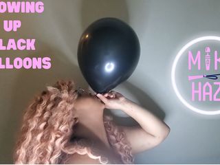 Mika Haze: Blowing up black balloons