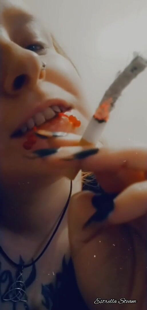 Estrella Steam: Smoking girl close up