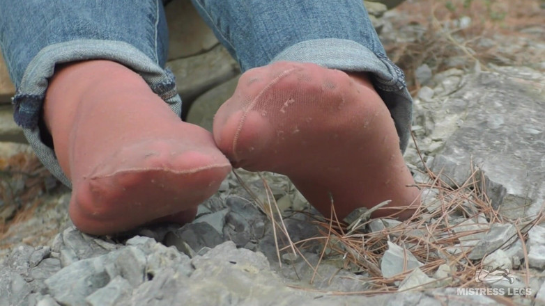 Mistress Legs: Jeans feet teasing in worned nylon socks outdoor