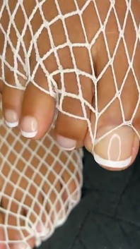 Ebony Girl Shows off Her Feet with French Pedicure in Her White Fishnets
