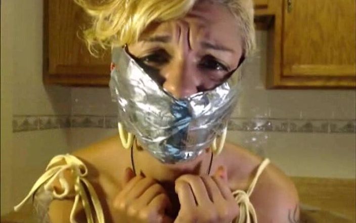 Selfgags classic: Rosalyn receives her worn panty delivery! *huge tape gag*