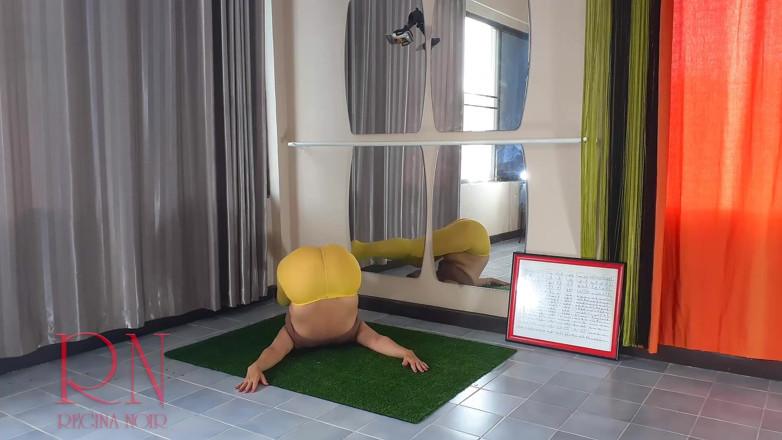 Regina Noir: Regina Noir. Yoga in yellow tights doing yoga in the...