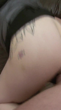 Tattooed Brunette Gets Fingered on the Couch and Cums Hard