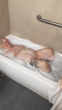 Naughty Bubbler Getting Soapy Masterbating in the Tub Her Pussy She Rubs