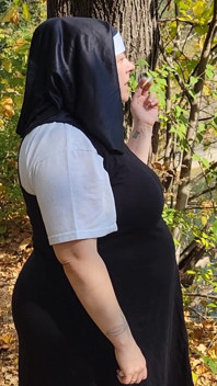 Smoking Pregnant Nun