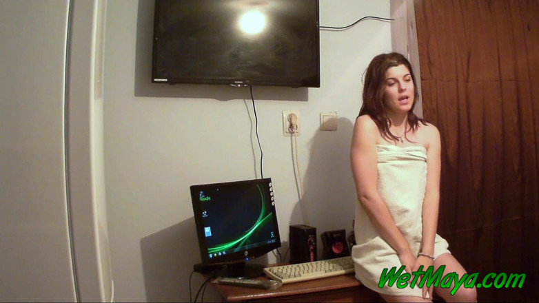 Wet Maya: Working on her computer makes Maya pee right there in...