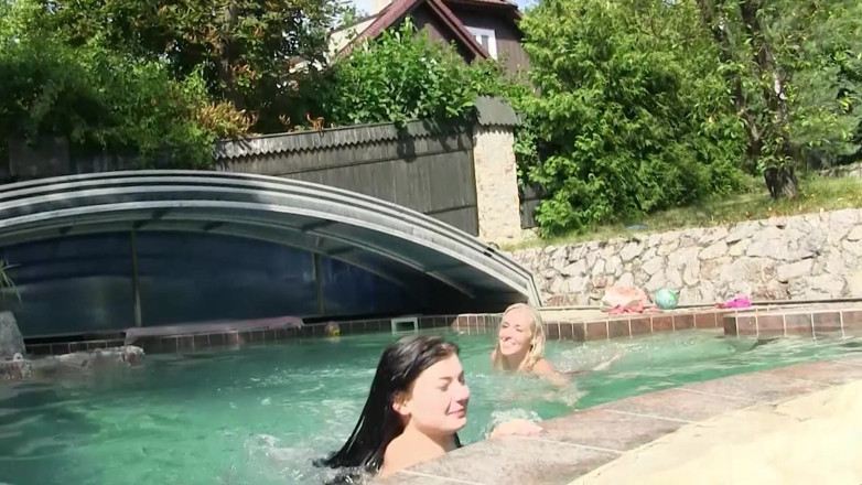 Sunset seductions: Blonde Uses Purple Toy on Brunette by the Pool
