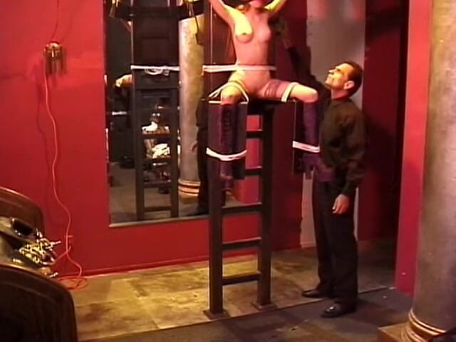 Dark Dungeon Secrets: Slave hottie bound to a chair blindfolded