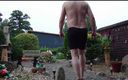 Carmen_Nylonjunge: Fat man in the front yard 1, swimming trunks