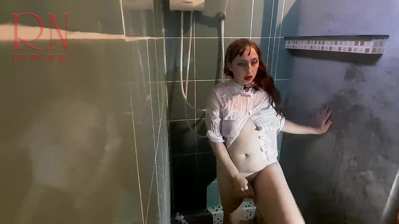 Regina Noir: A chick in clothes under the shower. Wet panties, wet...