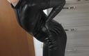 Mature cunt: PVC catsuit long gloves and boots posing