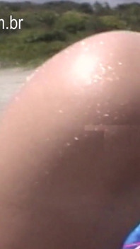 Naked wife on the beach with ass up and doing blowjob is filmed by cuckold