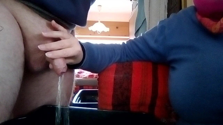 Sex hub couple: Jen is holding John's cock when he is peeing into...