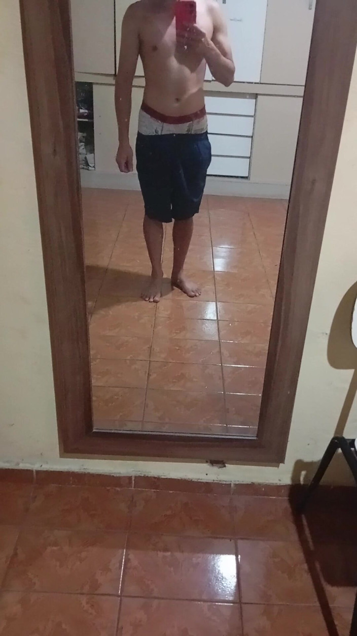Ray Oliver: Boy in Shorts in the Mirror