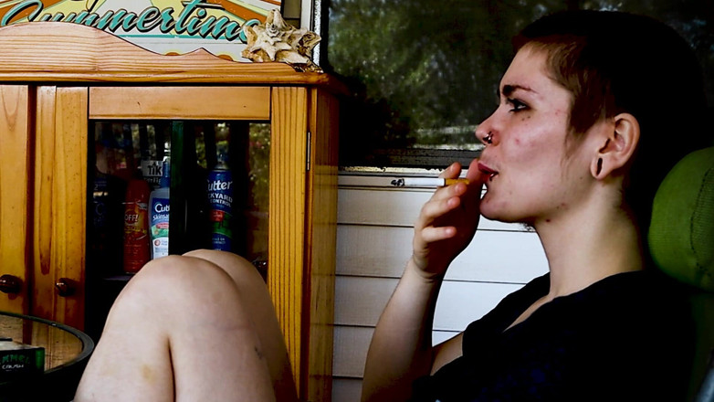 Vibra King Video: Shaved Head Goth Smokes Outside