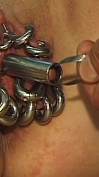 Redhead MILF Shows off Her Extreme Piercings