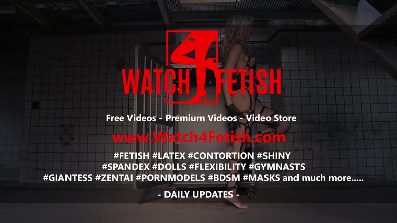 Watch4fetish: Latex beauty trapped in a cage