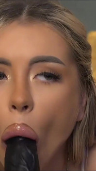 Hot Blonde Sucks and Fucks Her Black Dildo