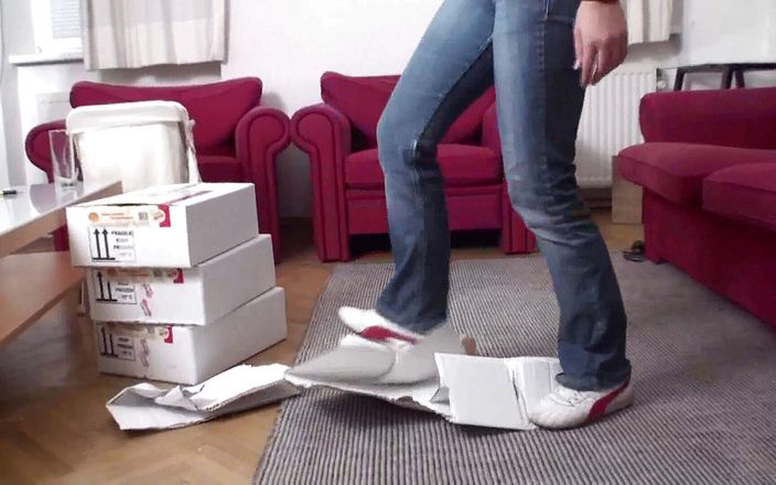 Foot Girls: Trampling boxes in the living room