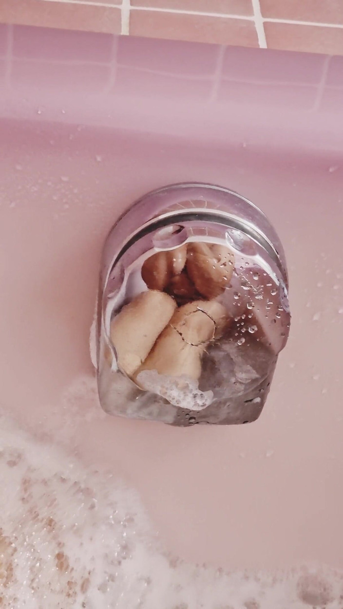 Daphnee Lecerf: Rubbing my feet on a bath flower
