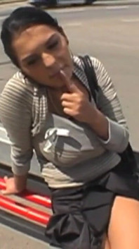 Hot brunette sucks a truck driver's cock in a parking lot making him cum