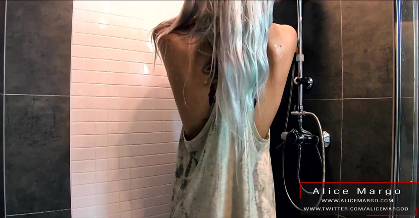 Alice Margo: Tattooed blonde takes a shower and rides dildo!