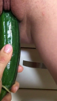 Russian babe Nataly Gold uses cucumber to screw her desired cunt